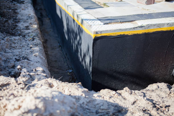 Professional Wet Basement Repair technician working in New Castle, KY
